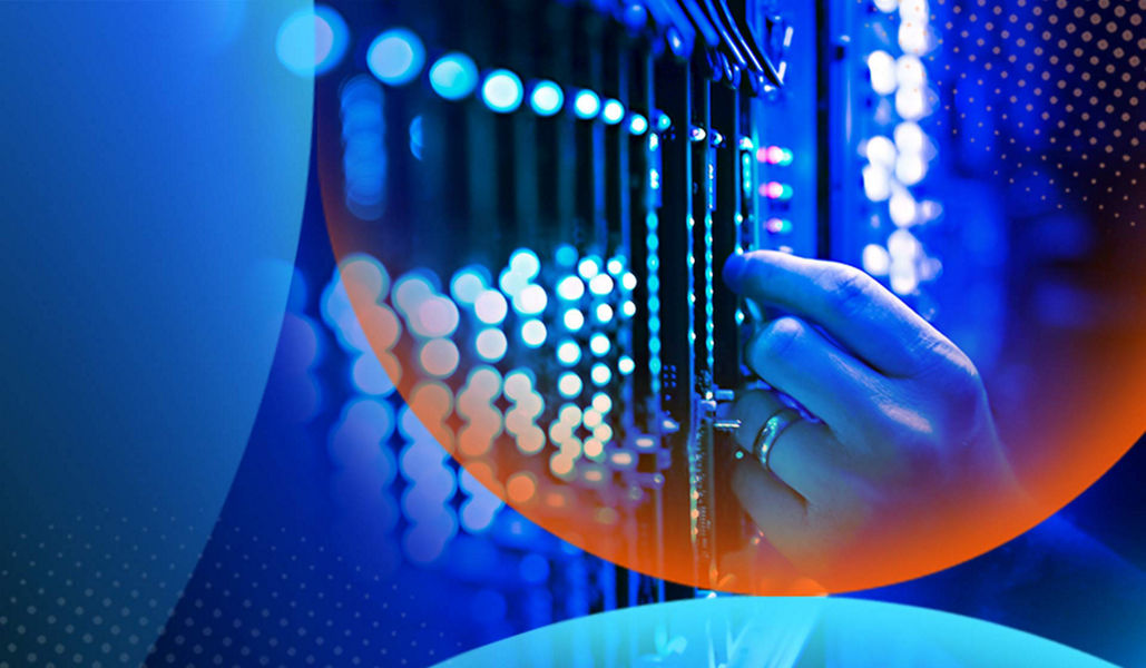 A hand touching a server in a dark room with bright blue and white lighting with an orange and blue lens overlay