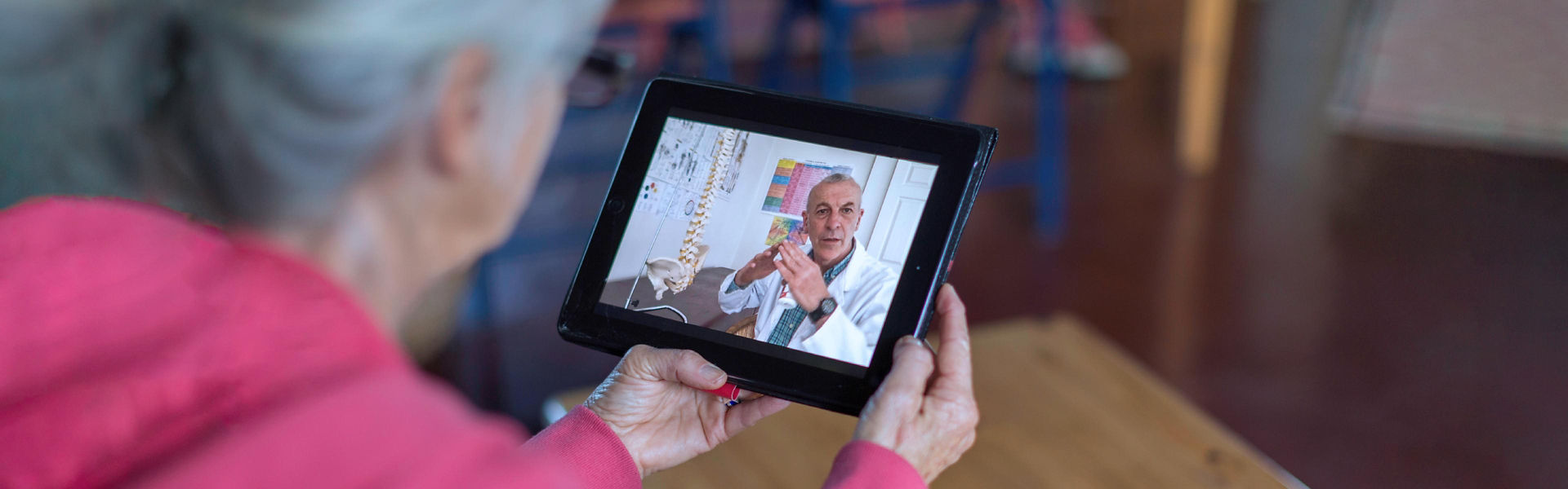 Woman on a video call with a doctor