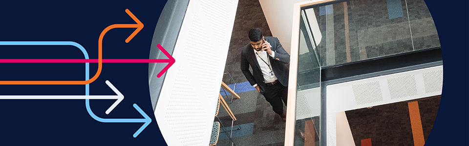 A businessman on the phone in an office