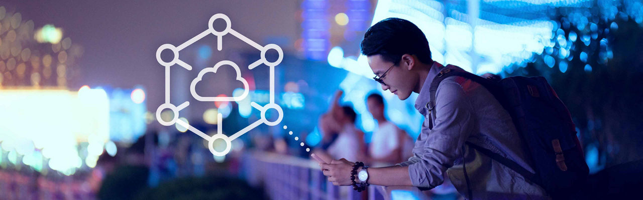 Man using cloud technology in public