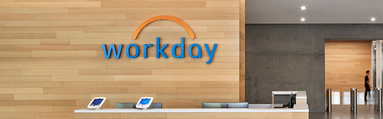 Workday HQ office logo on wooden wall above reception