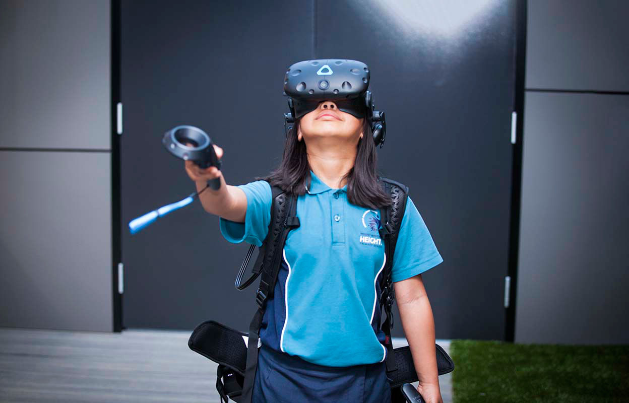 A student wearing a VR set