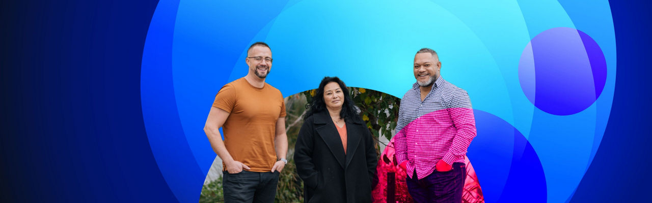 PSG staff on a datacom branded banner
