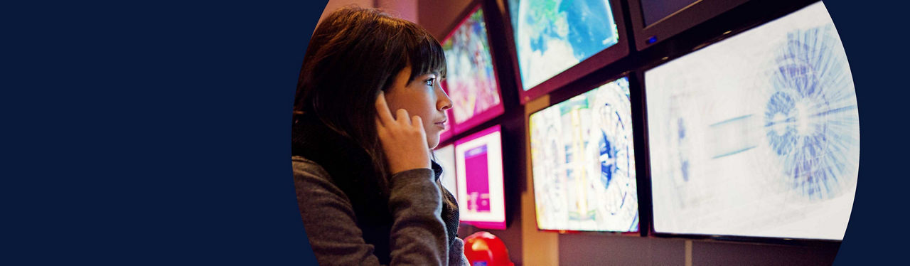 Young woman is working in a control room