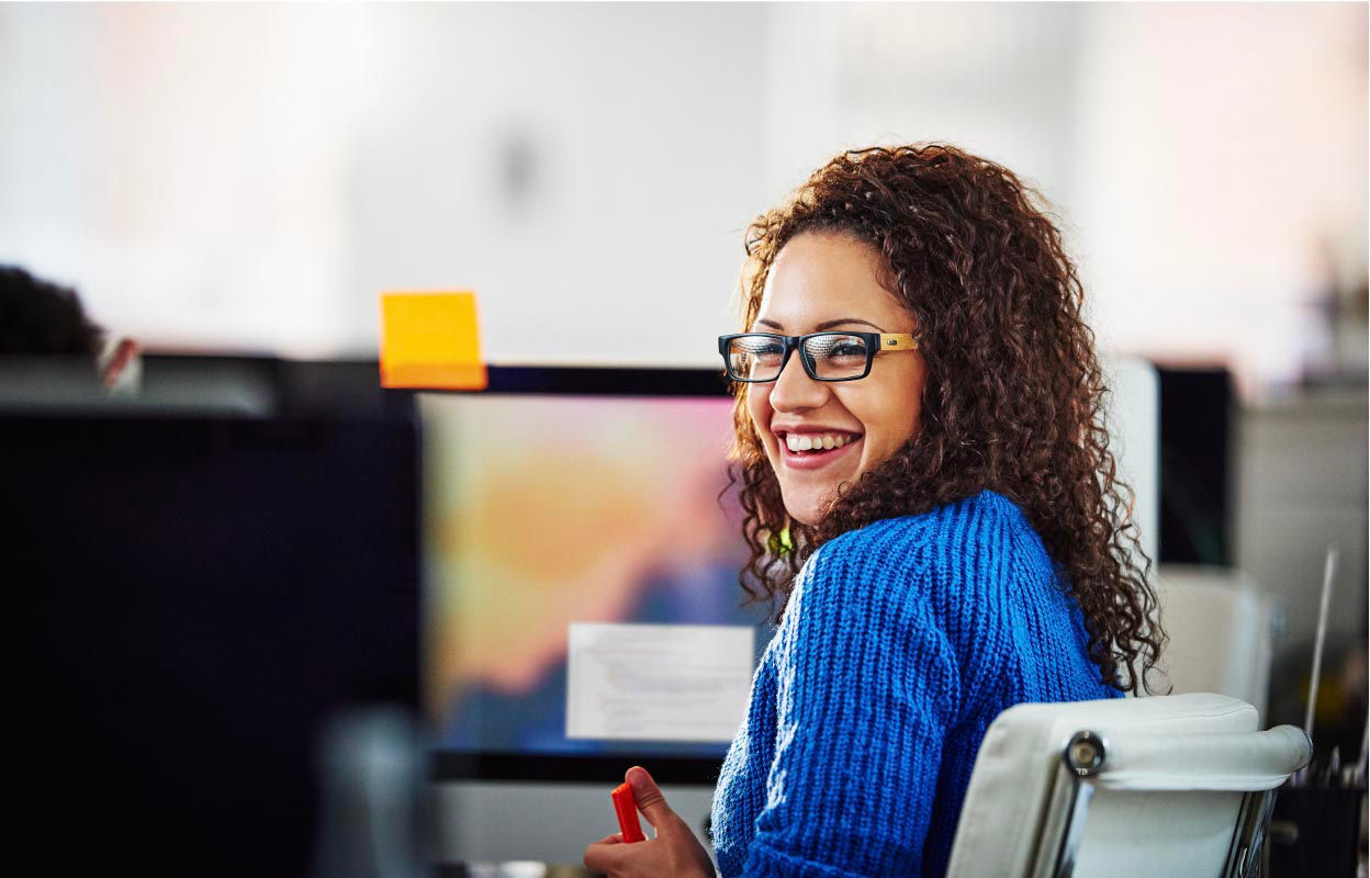 Lady smiling in an office