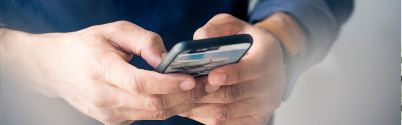 man holding a mobile phone