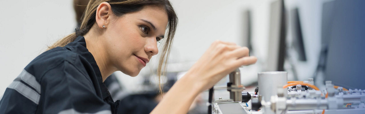 Lady touching electrical instruments