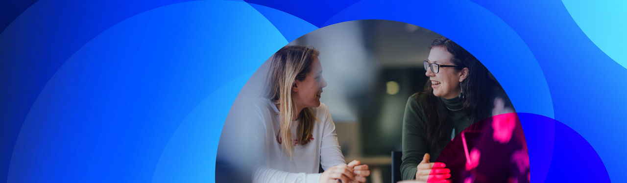 People at Datacom chatting in our Auckland office
