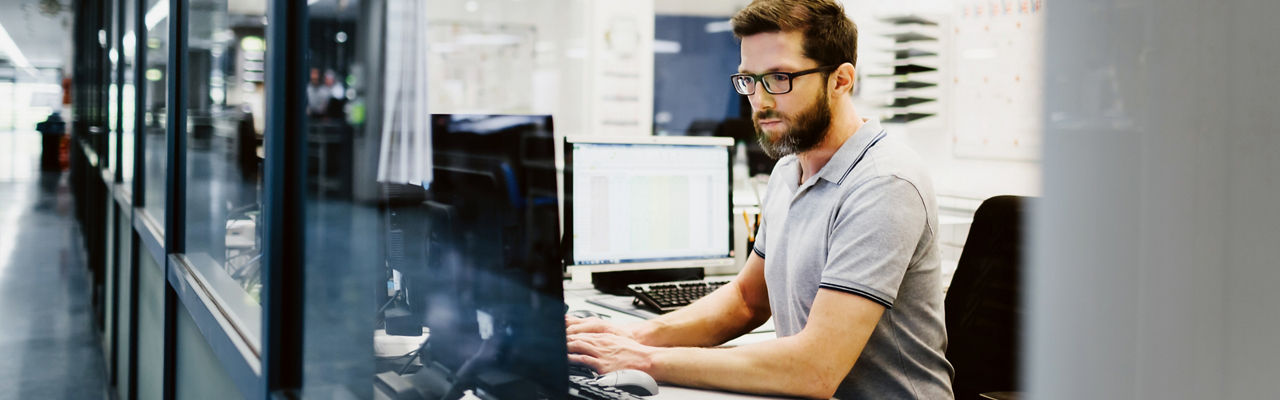 man working on a computer