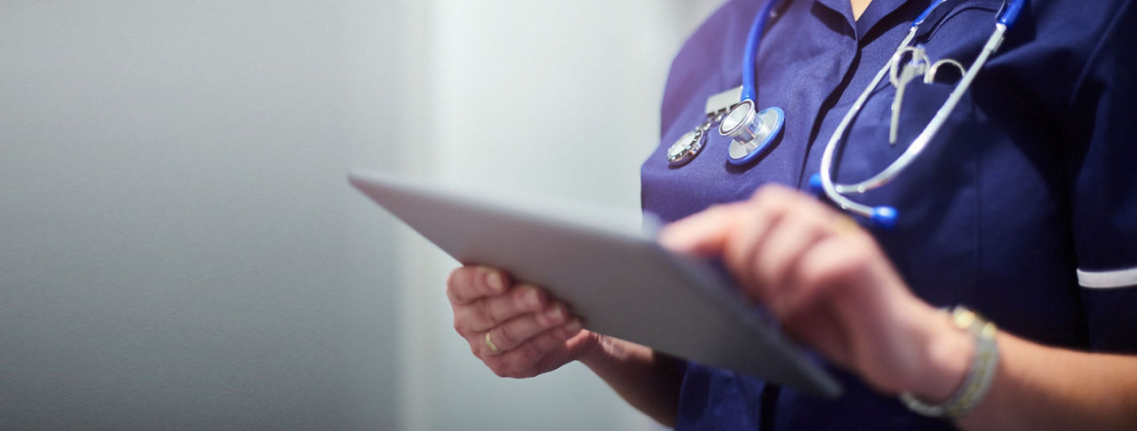 nurse using an ipad